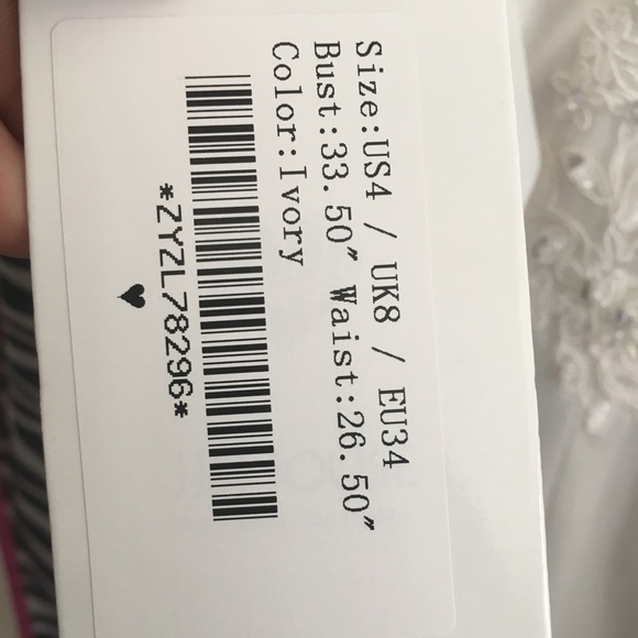 Size 4 never been worn or altered wedding dress! - Picture 5 of 7